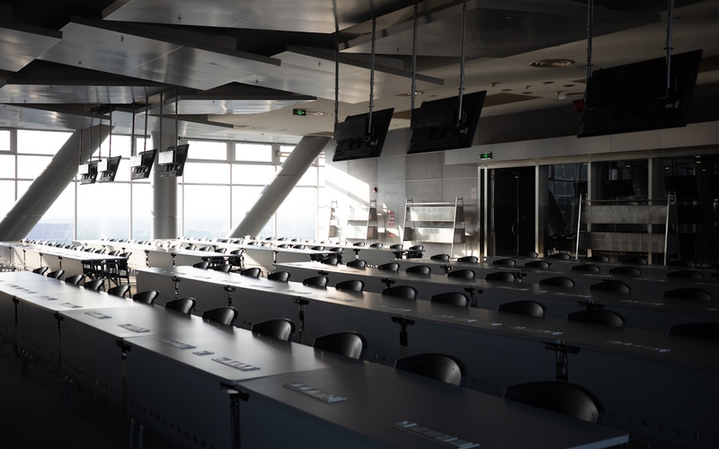 Event space at Aurora District prepared for a banquet